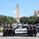UT Austin PD lined up cars at cross streeets on campus, south of the Tower in line with the Capitol