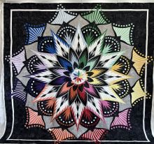 A quilt handmade by Stacey Napier, UT System's General Counsel to the Board of Regents.